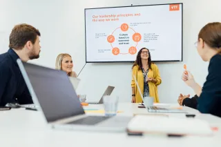 illustrative image of people having a meeting
